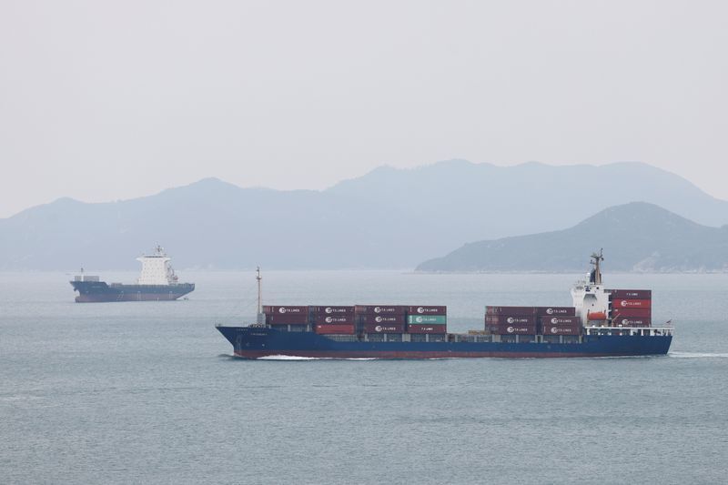 Shipping container sailing in the ocean